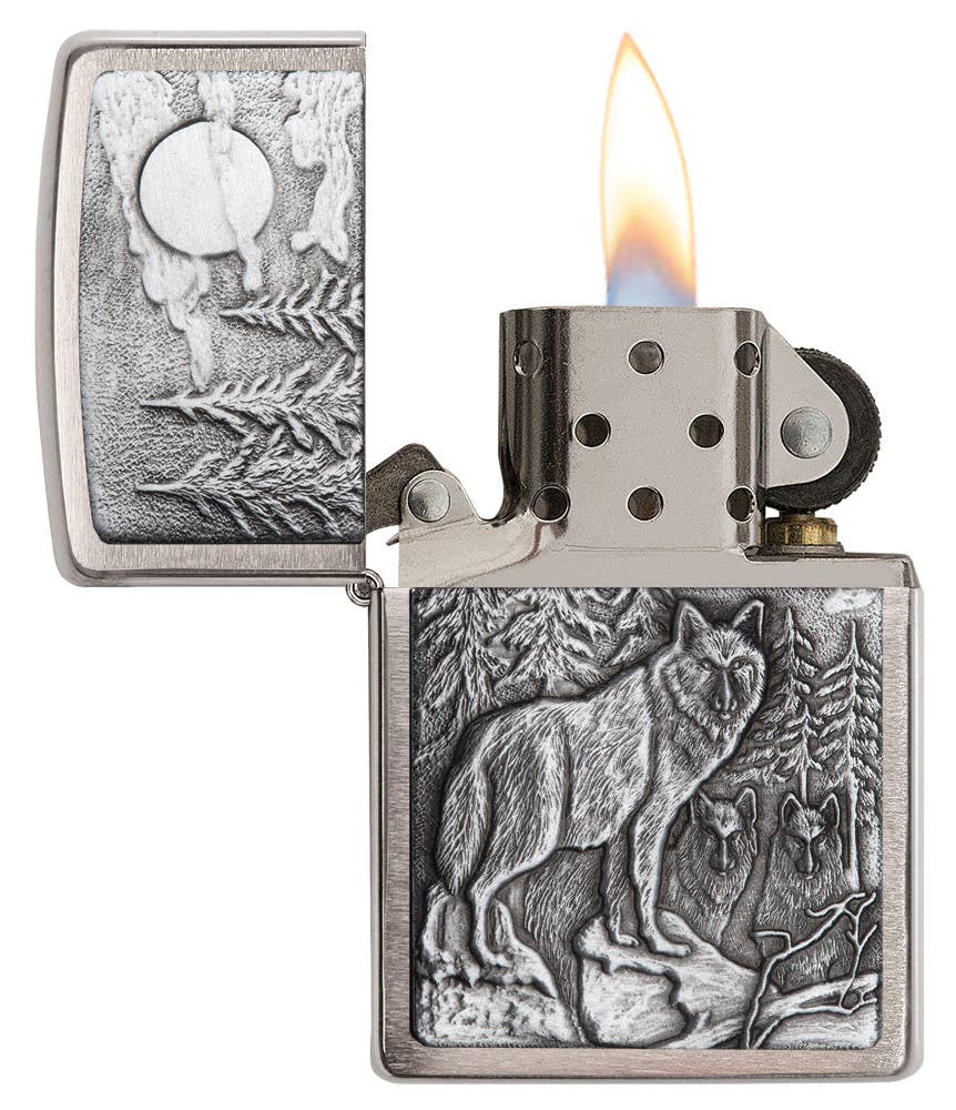 This Brushed Chrome windproof lighter has an emblem attached displaying a timber wolves in the wilderness. All metal construction; windproof design works virtually anywhere. Refillable for a lifetime of use. Comes packaged in a gift box. Available in our Smyrna, TN shop.

Made in USA
Fuel: Zippo lighter fuel (sold separately)
Lighter Specs: Height: 2.25" Width: 0.5" Depth: 1.5" Weight: 2.0 oz
Lifetime guarantee that "it works or we fix it free™" Zippo contact info on gift box.