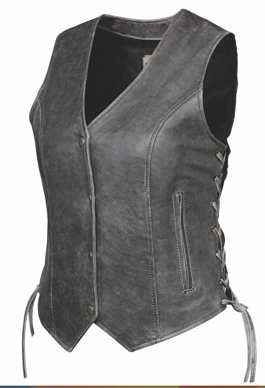 Distressed Grey ladies leather side laced motorcycle riding vest. Made from lighter weight Lambskin and contains conceal carry pockets on front insides. It has a 3 panel pack and snap front closure. It has a V-neck opening and a V-slot on the lower back for a better fit. Available for purchase in our leather shop in Smyrna, TN, near Nashville. Available in sizes small to 5x.