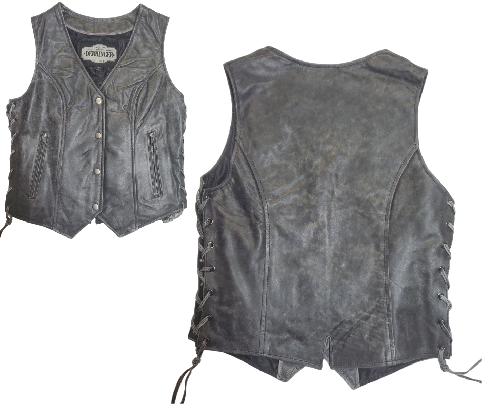 Distressed Grey ladies leather side laced motorcycle riding vest. Made from lighter weight Lambskin and contains conceal carry pockets on front insides. It has a 3 panel pack and snap front closure. It has a V-neck opening and a V-slot on the lower back for a better fit. Available for purchase in our leather shop in Smyrna, TN, near Nashville. Available in sizes small to 5x.
