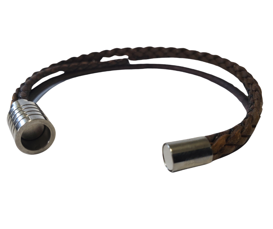 This 3 color braided leather bracelet features Three Strands of Fine Imported Quality Leather Cord. This unique cord is made by braiding 8 individual strands of leather. A secure stainless steel magnetic closure clasp serves as a magnificent visual center piece. Available at Buckle and Hide leather in Smyrna, TN.