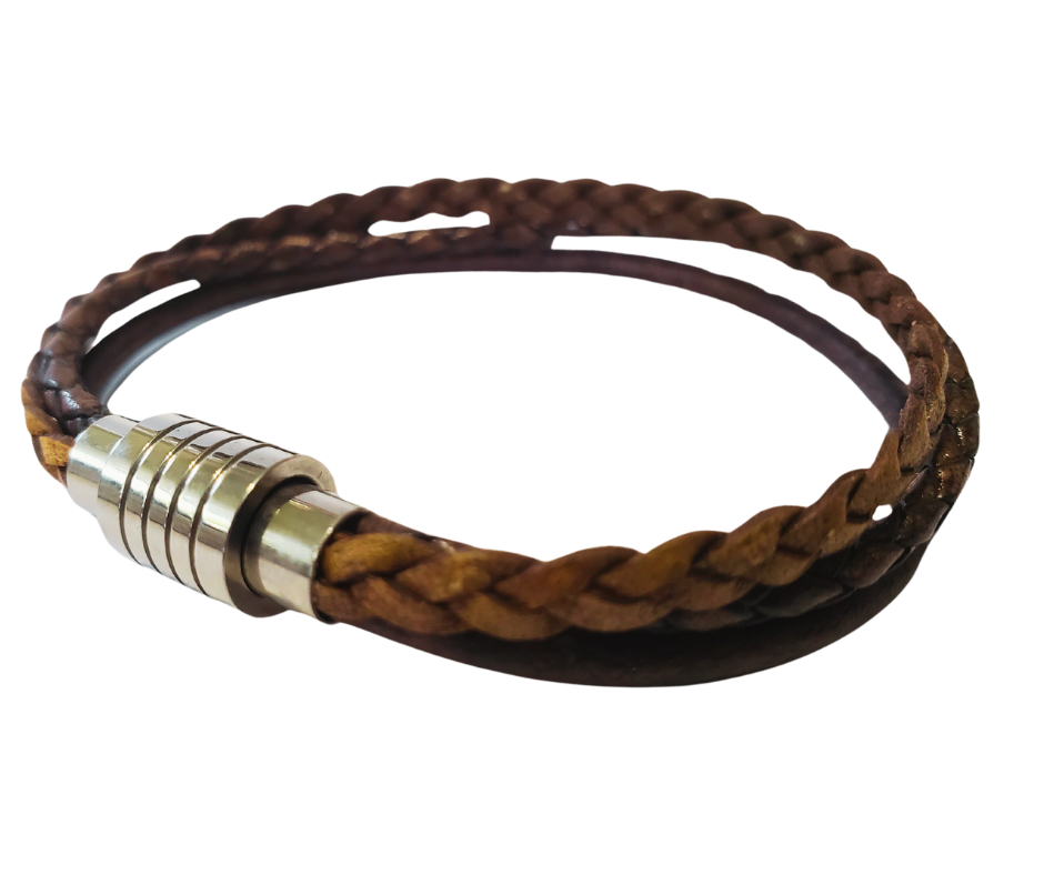 This 3 color braided leather bracelet features Three Strands of Fine Imported Quality Leather Cord. This unique cord is made by braiding 8 individual strands of leather. A secure stainless steel magnetic closure clasp serves as a magnificent visual center piece. Available at Buckle and Hide leather in Smyrna, TN.