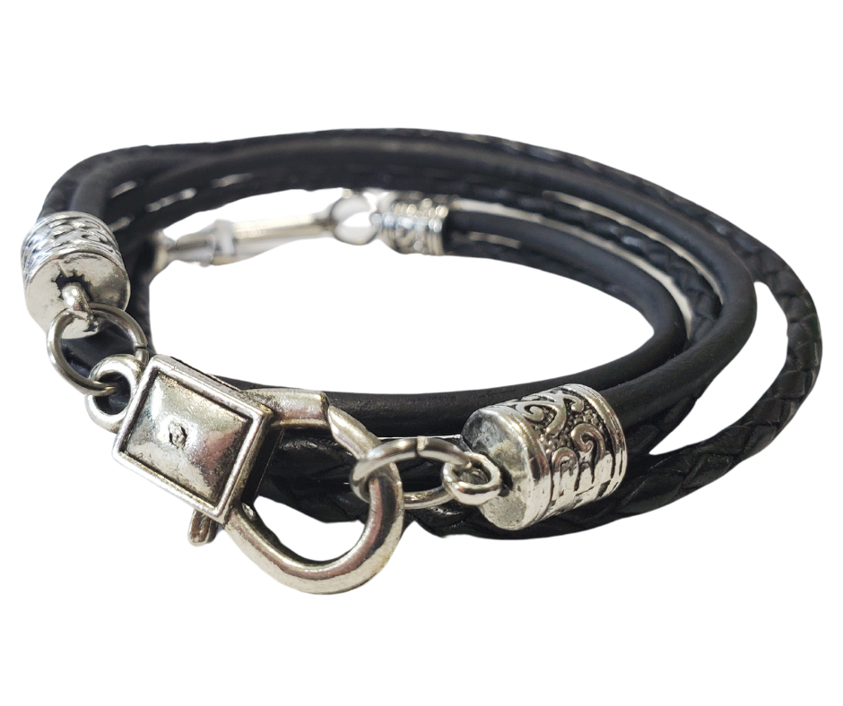 This double strand, Triple wrap, black braided, Leather Cross bracelet. Double strands of 3mm Leather Cord. The secure lobster clasp makes for a quick on and off. A great set of " His and Her" leather bracelets. Available at Buckle and Hide leather in Smyrna, TN.