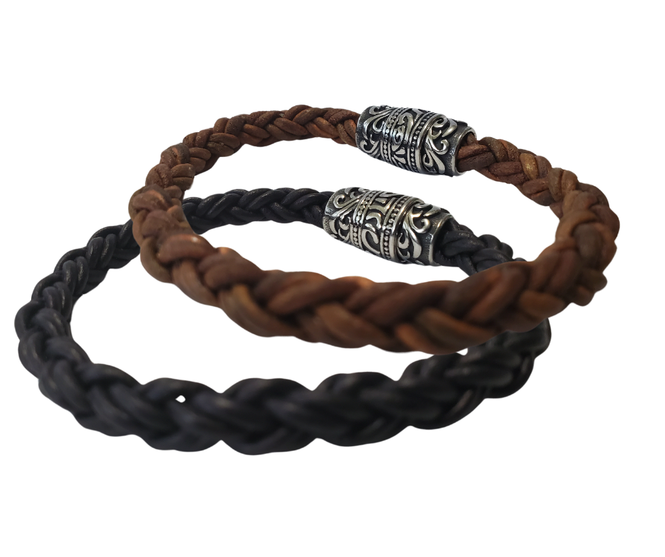 This features Thick 8mm Premium Quality Braided Leather Cord. This unique cord is made by braiding 8 individual strands of leather. Filigreed stainless steel magnetic clasp serves as a magnificent visual center piece. Available at Buckle and Hide leather in Smyrna, TN.