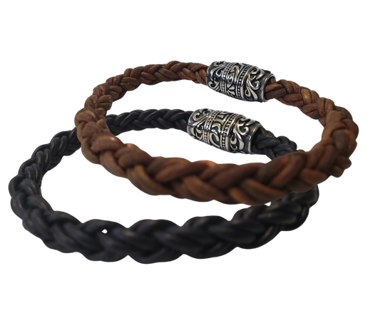 This features Thick 8mm Premium Quality Braided Leather Cord. This unique cord is made by braiding 8 individual strands of leather. Filigreed stainless steel magnetic clasp serves as a magnificent visual center piece. Available at Buckle and Hide leather in Smyrna, TN.