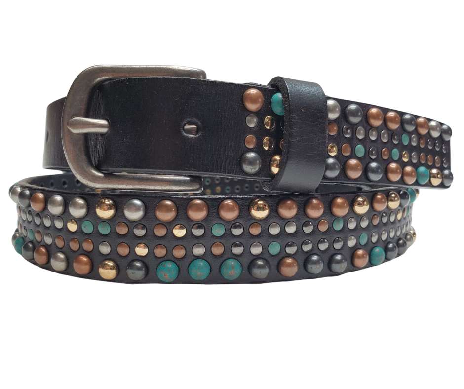 This 1" width belt, made of leather, features a perfect balance of copper, turquoise, old silver colored rivets to elevate any outfit. It's versatile enough to pair with jeans or dress up a dress with it's antique silver buckle. Find it at our store in Smyrna, TN, located near the iconic downtown Nashville. Imported.