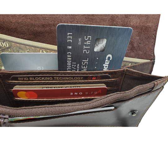 Updated Classic Distressed Brown or Black Long Style RFID Secure Tri-fold Chain Wallet. 2 cash slots, Extra backside pocket, 3-4 card slots, zippered pocket for all your important stash. Will darken with a nice patina with use. It&