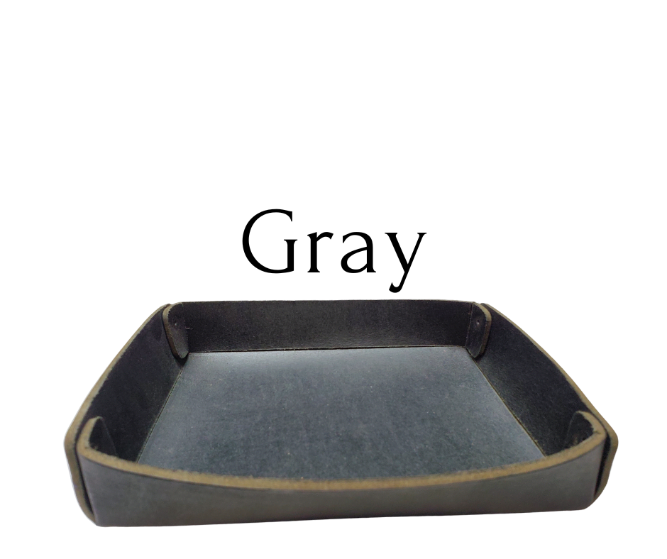 Full 1/8" thick Rectangle Leather Valet tray made in our Smyrna, TN shop. These are our most basic version that we are CLOSING OUT. Very limited stock available. There WILL be some variation from pics in colors. These were Samples and Store Displays. THESE DO NOT COLLASPE like our other valets.