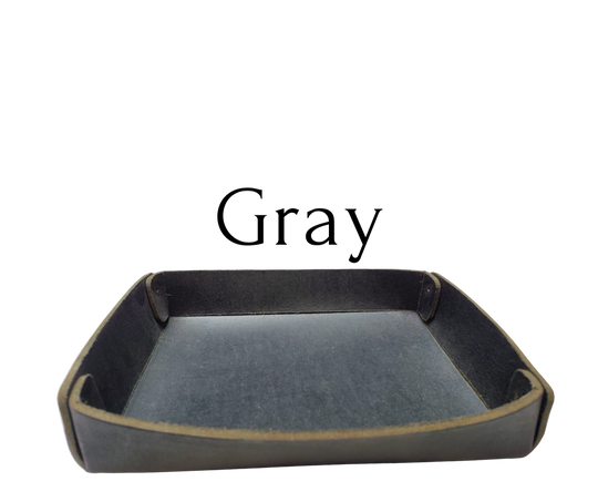 Full 1/8" thick Rectangle Leather Valet tray made in our Smyrna, TN shop. These are our most basic version that we are CLOSING OUT. Very limited stock available. There WILL be some variation from pics in colors. These were Samples and Store Displays. THESE DO NOT COLLASPE like our other valets.