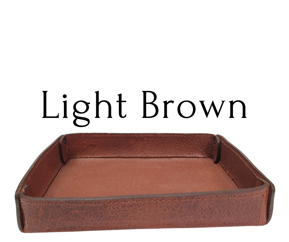 Full 1/8" thick Rectangle Leather Valet tray made in our Smyrna, TN shop. These are our most basic version that we are CLOSING OUT. Very limited stock available. There WILL be some variation from pics in colors. These were Samples and Store Displays. THESE DO NOT COLLASPE like our other valets.