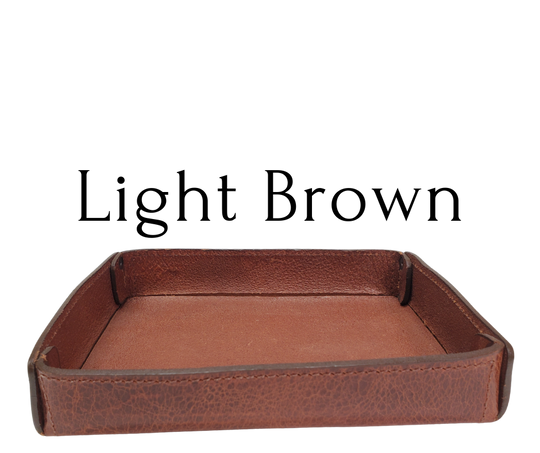 Full 1/8" thick Rectangle Leather Valet tray made in our Smyrna, TN shop. These are our most basic version that we are CLOSING OUT. Very limited stock available. There WILL be some variation from pics in colors. These were Samples and Store Displays. THESE DO NOT COLLASPE like our other valets.