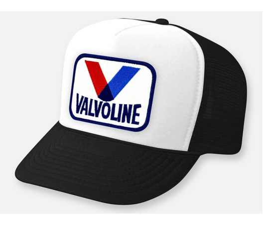 Splash some Valvoline on it! This curved bill Valvoline hat is part of our new Classic Trucker Hat Collection. This mean trucker hat features a big burly vintage Valvoline Oil patch sewn on the front panel. This hat is a chunk outta vintage racing and is as old school cool as it gets!&nbsp;Black and White Foam vintage trucker mesh cap proudly. Get yours now at our Smyrna, TN store or online! Snap back adjustment.