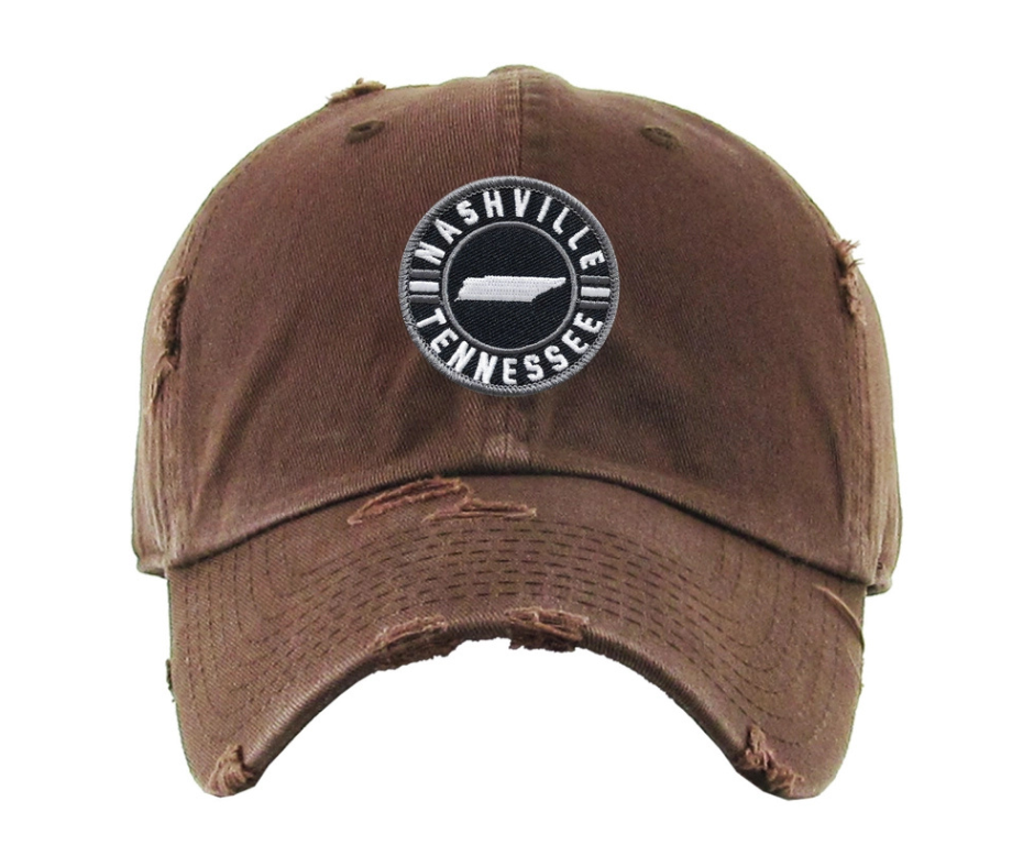 Embroidered Nashville Tennessee Patch Vintage distressed washed style 100% breathable premium cotton Pre-curved visor with 8-row stitching on visor. Matching under visor 6 panel low profile unconstructed Lightweight, durable, smooth, with a hint of stretch One size fits most, Adjustable metal buckle back closure.&nbsp;Shop now at our Smyrna, TN store or online.