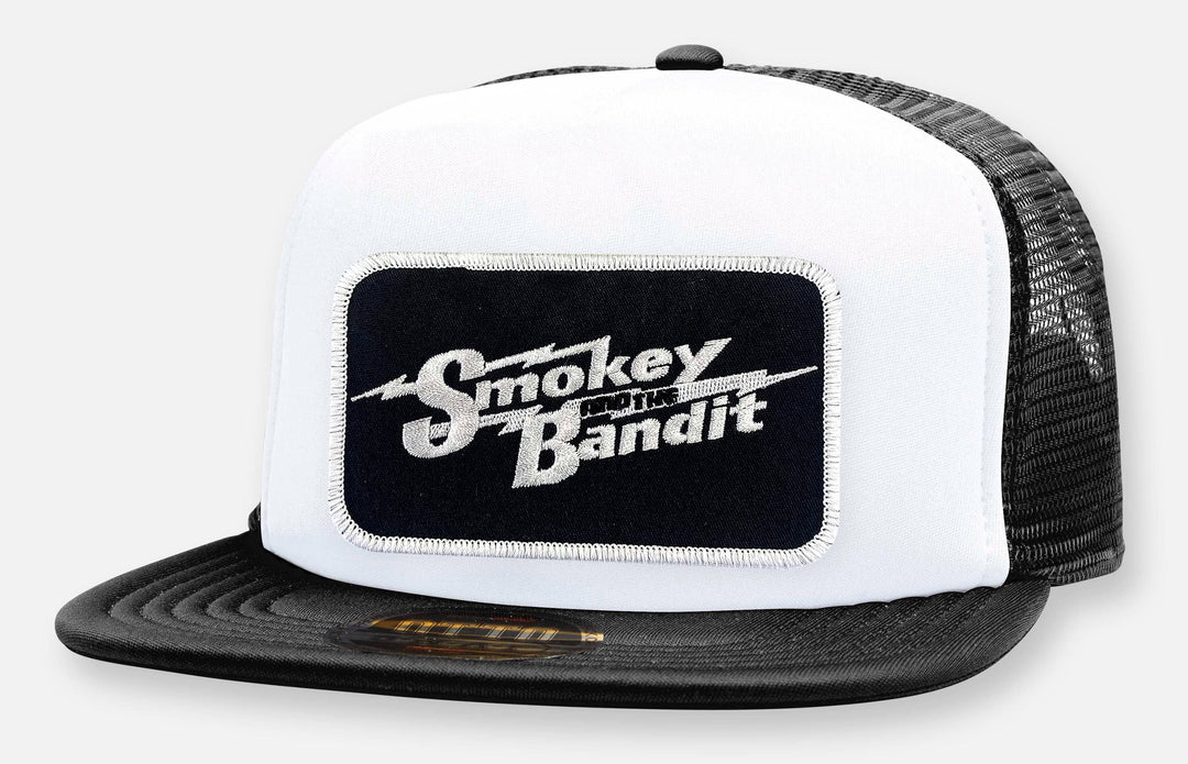 This Smokey and the Bandit Patch hat is part of our new Classic Trucker Hat Collection. This mean trucker hat features a big burly vintage Smokey and the Bandit patch sewn on the front panel. Get yours at our Smyrna, TN shop not far Broadway downtown Nashville.