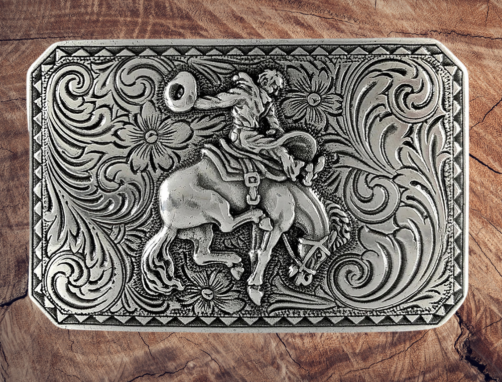 The Virgil is known for being one of the Best Bucking Horses of all time! So we named this Bronc Belt Buckle after him so you can pay homage to the best. It's rectangle shape makes it easy on the mid section to wear and it's Antique Silver finish will match nearly anything you wear. See this buckle at our Smyrna, TN shop not far from the nearest Boot store.