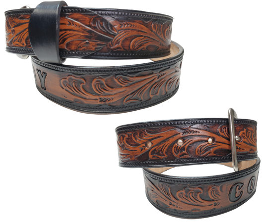 The Waggoneer Name Belt is a Classic Scroll pattern that will lift any look you going for. Embossed Western floral with a bead border. Made from approx. 9/10 oz. veg-tan cowhide with 2 snaps for easy buckle change. Made in our Smyrna, TN shop. If you visiting from outa town stop by and visit us.
