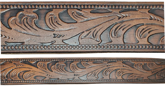 The Waggoneer Name Belt is a Classic Scroll pattern that will lift any look you going for. Embossed Western floral with a bead border. Made from approx. 9/10 oz. veg-tan cowhide with 2 snaps for easy buckle change. Made in our Smyrna, TN shop. If you visiting from outa town stop by and visit us.