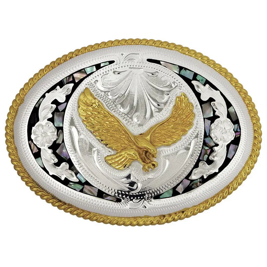 The "Isaiah's Eagle" belt buckle is a stylish showstopper. Crafted from German Silver with a brass overlay and shimmering abalone inlay, it showcases a soaring eagle framed by a rope-edged oval. Designed to fit belts up to 1 3/4" wide, this 4" x 3" buckle adds a bold touch to any outfit. Made in China and available at our Smyrna, TN shop near Nashville, it’s the perfect blend of flair and craftsmanship.