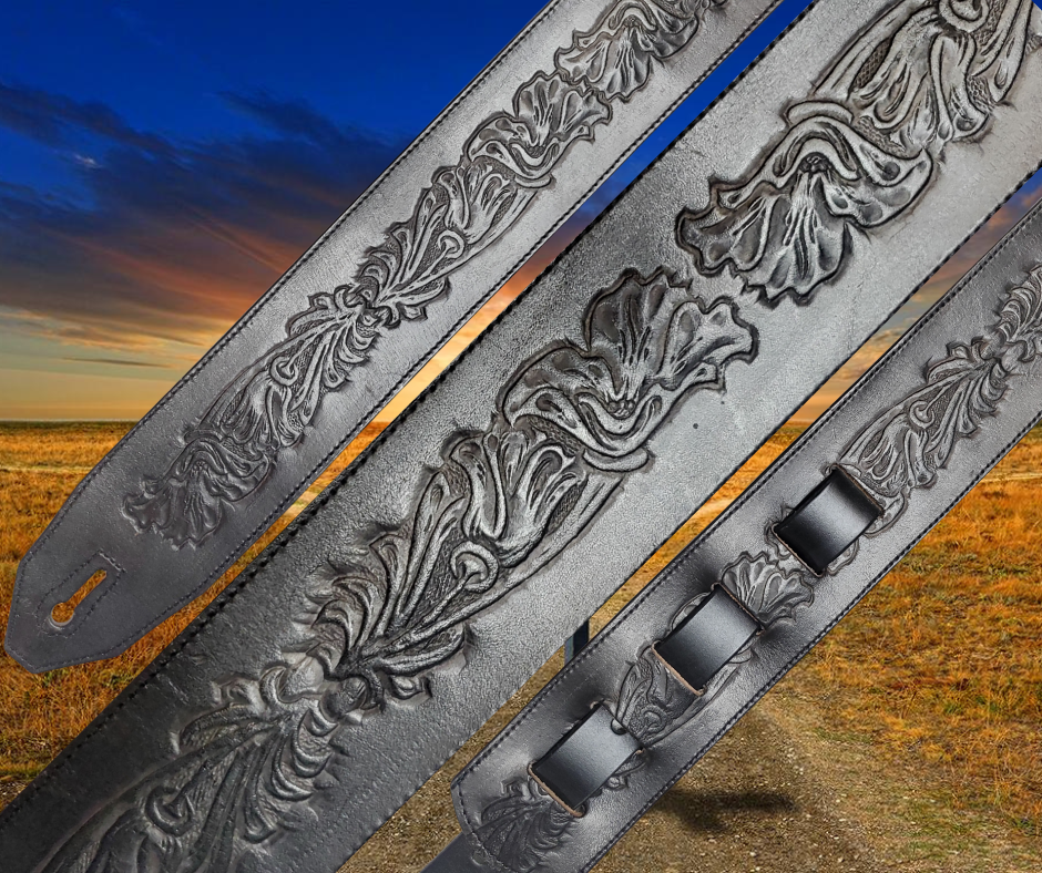 Great Musicians, Singers and great songs have been a staple for years in Nashville. Be on your way starting your journey with this Western embossed 2 1/2"main Body of the Guitar strap is approx. 1/8" thick. The classic adjustment style goes from approx. 42" to 56" at it's longest . Made just outside Nashville in our Smyrna, TN. shop. It will will get a great patina over time.