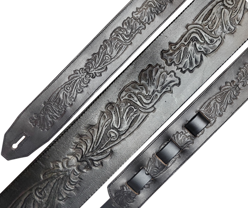 Great Musicians, Singers and great songs have been a staple for years in Nashville. Be on your way starting your journey with this Western embossed 2 1/2"main Body of the Guitar strap is approx. 1/8" thick. The classic adjustment style goes from approx. 42" to 56" at it's longest . Made just outside Nashville in our Smyrna, TN. shop. It will will get a great patina over time.