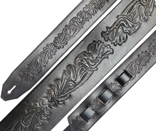 Great Musicians, Singers and great songs have been a staple for years in Nashville. Be on your way starting your journey with this Western embossed 2 1/2"main Body of the Guitar strap is approx. 1/8" thick. The classic adjustment style goes from approx. 42" to 56" at it's longest . Made just outside Nashville in our Smyrna, TN. shop. It will will get a great patina over time.
