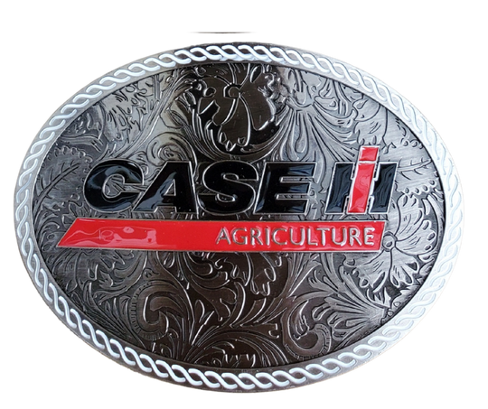 CASE Farmall IH Belt Buckle. Western Floral background oval with classic logo in Red, Black and a White rope style border. Size approx. 3 3/4" wide x 2 3/4" height, Fits up to 1 1/2" wide belts. Available in our shop in Smyrna, TN just outside Nashville.