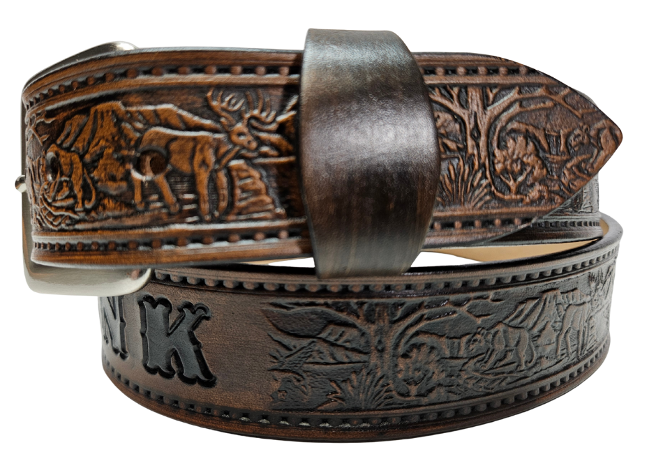 This solid strip of Veg Tan cowhide, is hand stained in 3 brown options, with smooth, finished edges. Embossed with Deer, Mountain Lion, and Duck scene down length of belt, or have name added to scene up to 8 letters. Belt thickness is approx. 1/8", and 1 1/2" wide. Sizes available are 34" to 44" from buckle end to hole most worn. Attached with 2 snaps is a Brushed Nickel plated solid brass buckle. Handmade in our Smyrna, TN, USA shop a short trip from Nashville.