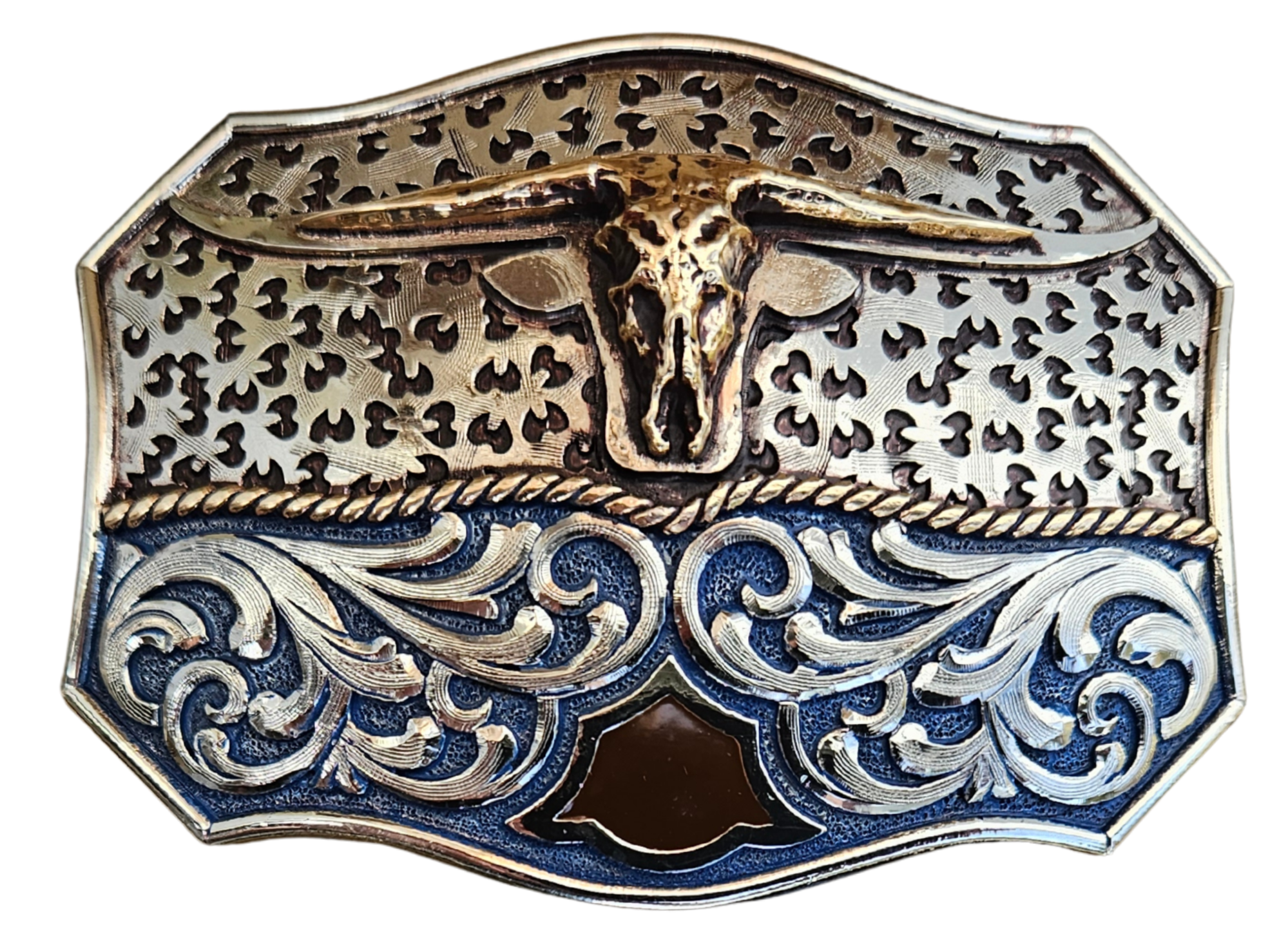 The Winter Wind Belt Buckle has the ever classic Longhorn design accented with a multi Western design influences like scrolls with a blue background with a touch of Dark brown. A Classic Western belt buckle at it's best! Made from German Silver and engraved and layered metals in a tri-color Western design. Available in our Smyrna, TN shop, a short distance from Nashville.

Dimensions: Width 4”, Height 2.7”
Standard 1.5” Swivel

