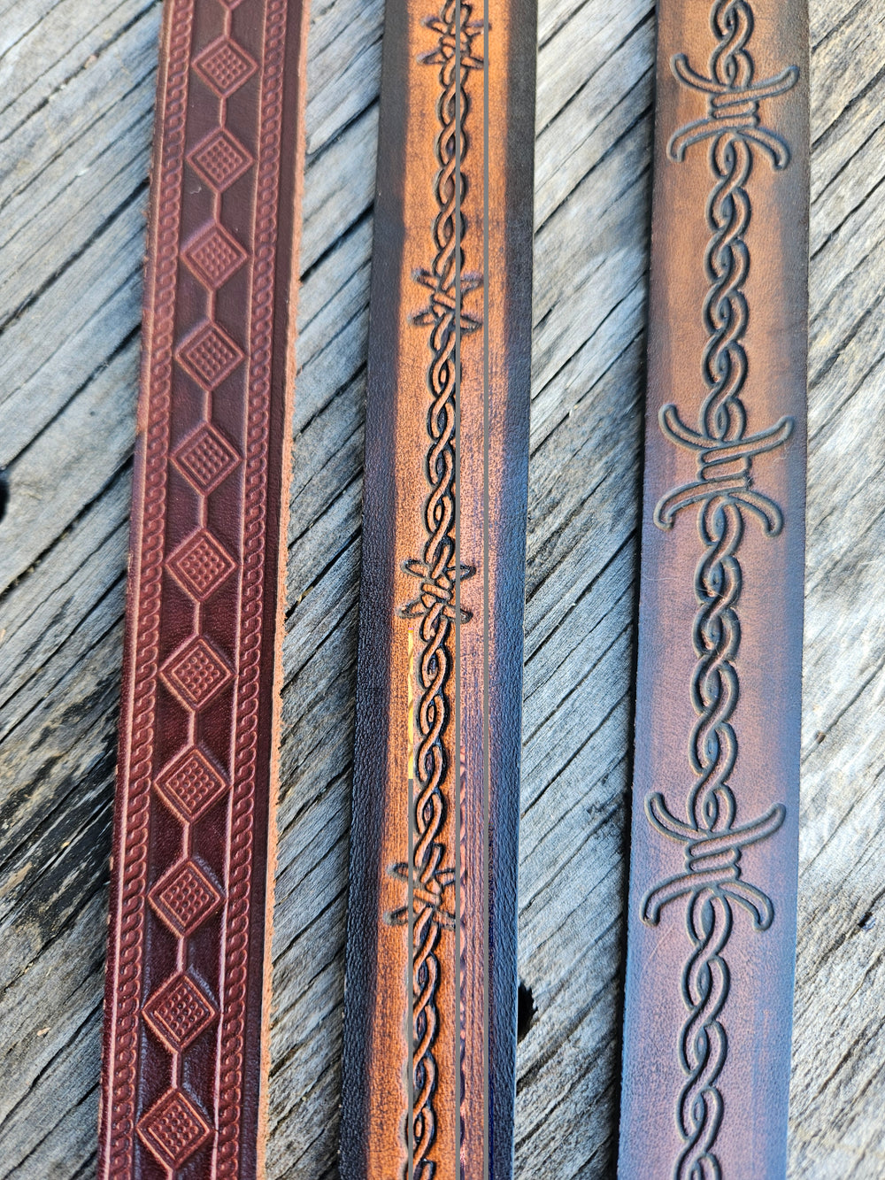 Classic Western Styled, embossed pattern leather hatbands that are 3/4" wide fitting up to size 7 1/2 hat. Fit's most any hat with adjustable bead and leather 1/8" string. Will fit most WESTERN crowned hats. Made in our Smyrna, TN. shop a short drive from downtown Nashville, TN.

These are random hatbands made in store and we put them in a 3 packs at a Discounted price. See the others
23" long (without tie string)
NO subs.