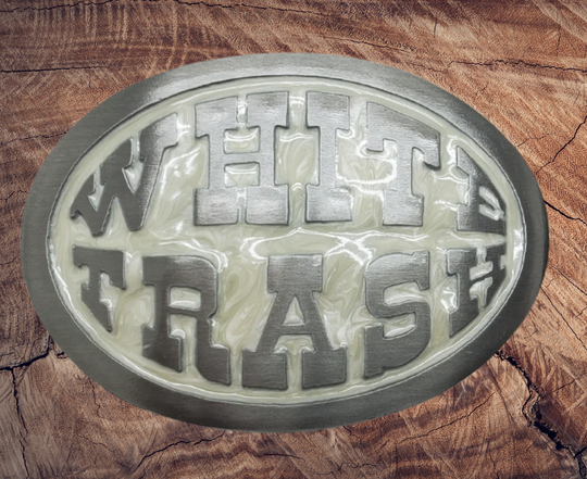This White Trash Belt Buckle features a stylish oval design on a pearlized epoxy background. Made in the USA, it can easily be attached to any belt and fits 1 1/2" belts. Find it at our Smyrna, TN shop, just a short drive from Downtown Nashville. The size is approximately 3-1/2" x 2-3/4".