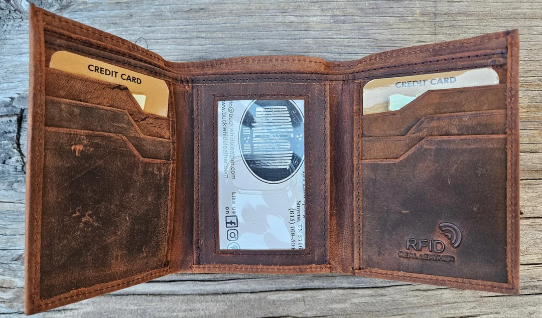 The Winston Tri-fold leather wallet will be your daily carry. Equipped with 8 credit card slots and 1 ID window slot in the center. The main compartments has a cash divider. Lined with RFID blocking. Available in our Smyrna, TN shop near Sewarts Landing.

Made in India.
Approx. Size: 3 1/4"x 4 1/4" when closed.