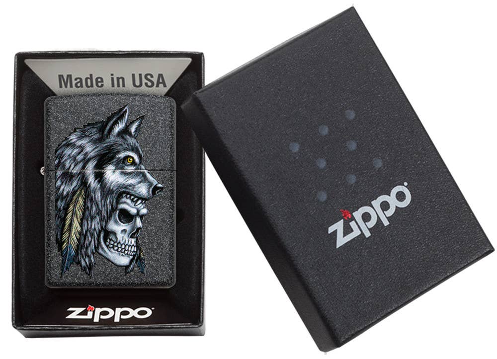 This Iron Stone lighter features an intense skull and wolf design, digitally-transferred color image. All metal construction; windproof design works virtually anywhere. Refillable for a lifetime of use. Comes packaged in a gift box. Available in our Smyrna, TN shop.

Made in USA
Fuel: Zippo lighter fuel (sold separately)
Lighter Specs: Height: 2.25" Width: 0.5" Depth: 1.5" Weight: 2.0 oz
Lifetime guarantee that "it works or we fix it free™" Zippo contact info on gift box.