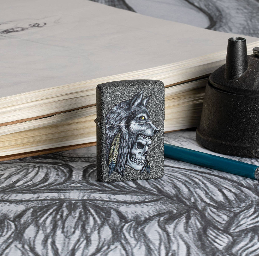 This Iron Stone lighter features an intense skull and wolf design, digitally-transferred color image. All metal construction; windproof design works virtually anywhere. Refillable for a lifetime of use. Comes packaged in a gift box. Available in our Smyrna, TN shop.

Made in USA
Fuel: Zippo lighter fuel (sold separately)
Lighter Specs: Height: 2.25" Width: 0.5" Depth: 1.5" Weight: 2.0 oz
Lifetime guarantee that "it works or we fix it free™" Zippo contact info on gift box.