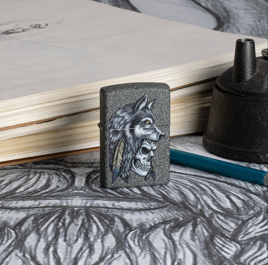 This Iron Stone lighter features an intense skull and wolf design, digitally-transferred color image. All metal construction; windproof design works virtually anywhere. Refillable for a lifetime of use. Comes packaged in a gift box. Available in our Smyrna, TN shop.

Made in USA
Fuel: Zippo lighter fuel (sold separately)
Lighter Specs: Height: 2.25" Width: 0.5" Depth: 1.5" Weight: 2.0 oz
Lifetime guarantee that "it works or we fix it free™" Zippo contact info on gift box.
