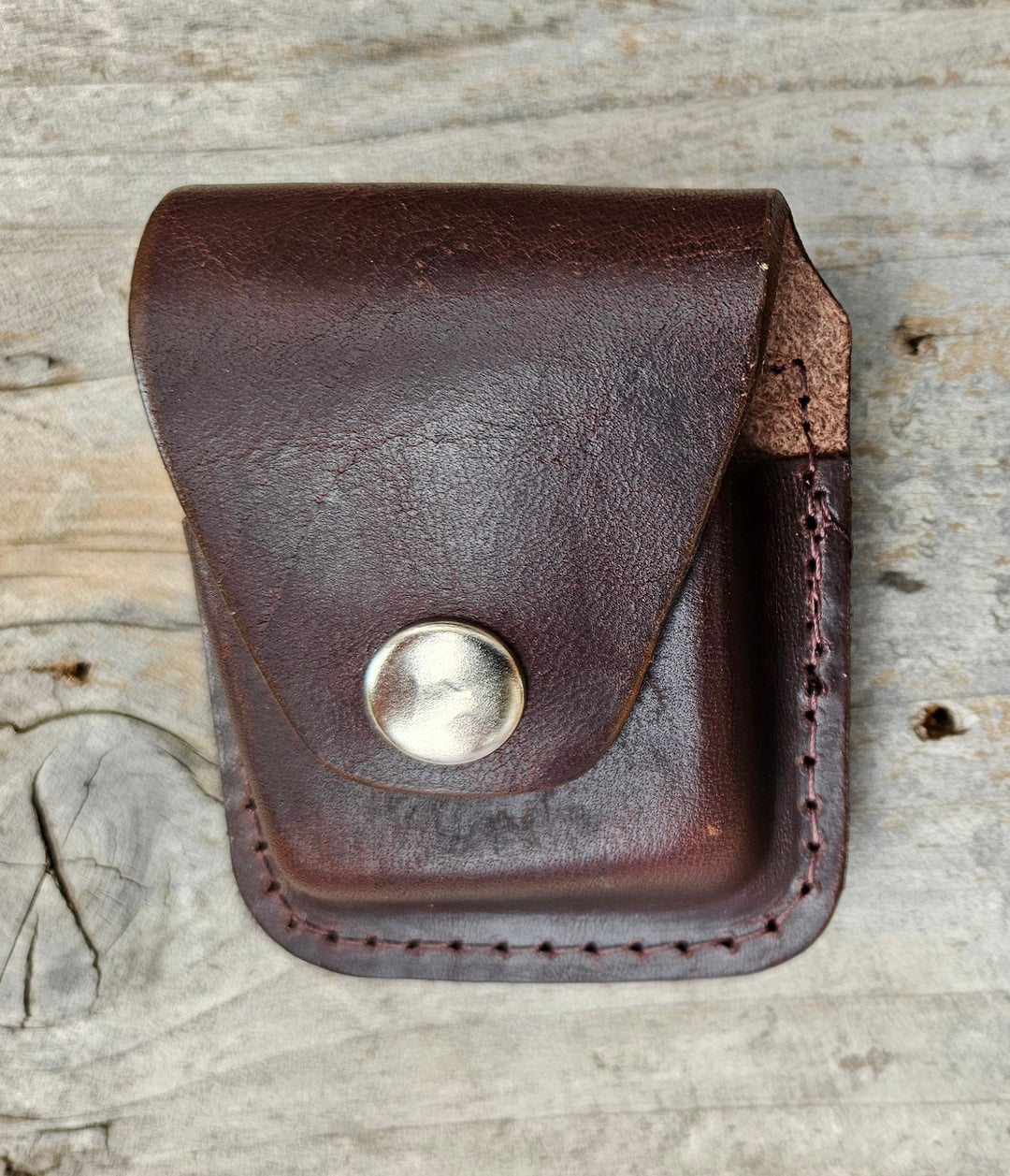 Made in USA Leather Case to hold "Zippo Style" Lighter, belt loop on back . Available in Black or Brown.