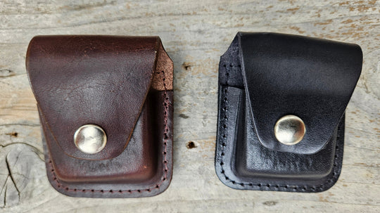 Made in USA Leather Case to hold "Zippo Style" Lighter, belt loop on back . Available in Black or Brown.