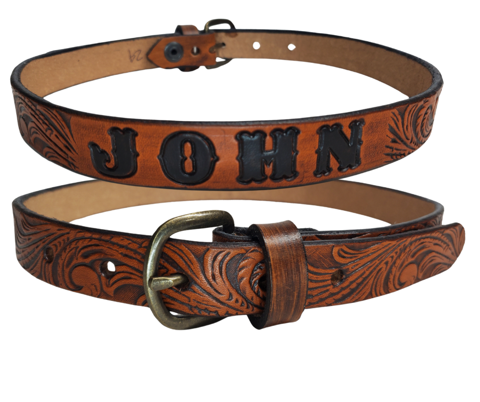 Our Baby NAME leather belts are just like the belts for dad or mom. Full grain American vegetable tanned cowhide approx. 1/8"thick. Width is 1" and includes Nickel plated or Antique Brass colored buckle. We Hand Finish and burnish these just like our adult belts. Made in our Smyrna, TN, USA shop. A SINGLE snap makes a easy buckle change if desired.  Choose with or without name, if without name, design will cover entire length of belt. Made in our Smyrna, TN shop outside of Nashville.
