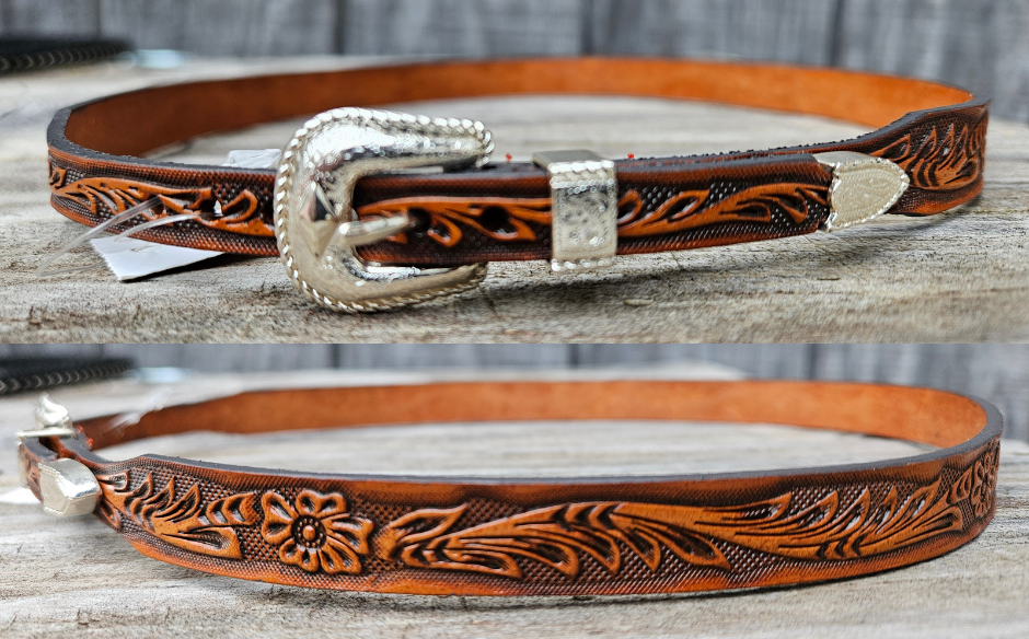The Buckaroo Leather hatband will take your hat to the next level with a Embossed Western Floral pattern right out of a classic western movie. Ride over to our Smyrna, TN shop not far from Opry Mills Mall.

Tapers 1/2" to 3/8"
Measures 27"
Silver Buckle and Keeper for Easy Adjustment