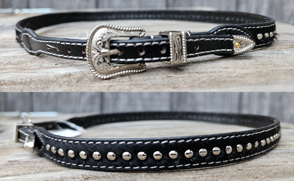Calf Roper hatband features a Calf hair body with Round silver Studs and White stitching around the nearly the entire band. This hatband uses a belt style adjustment with a rounded silver buckle. Get these at our Smyrna, TN shop not far from Franklin, TN.

Tapers 1/2" to 3/8"&nbsp;
Measures 27"Genuine
Adjustable Leather Strap