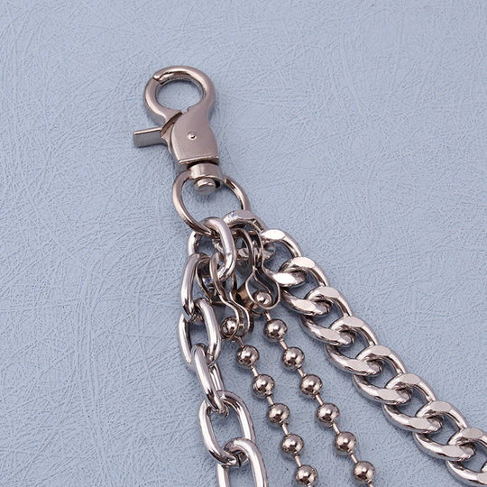 Dress up your favorite jeans with our Hip Hop Quad Jean Chain. The 2 Belt loop clips easily attach to you favorite old jeans. All you need is your best shirt or top and your good to go. Now in stock at our Smyrna, TN shop not far from the First Bank Amphitheater.

Metal alloy
See pic for dimensions
Imported