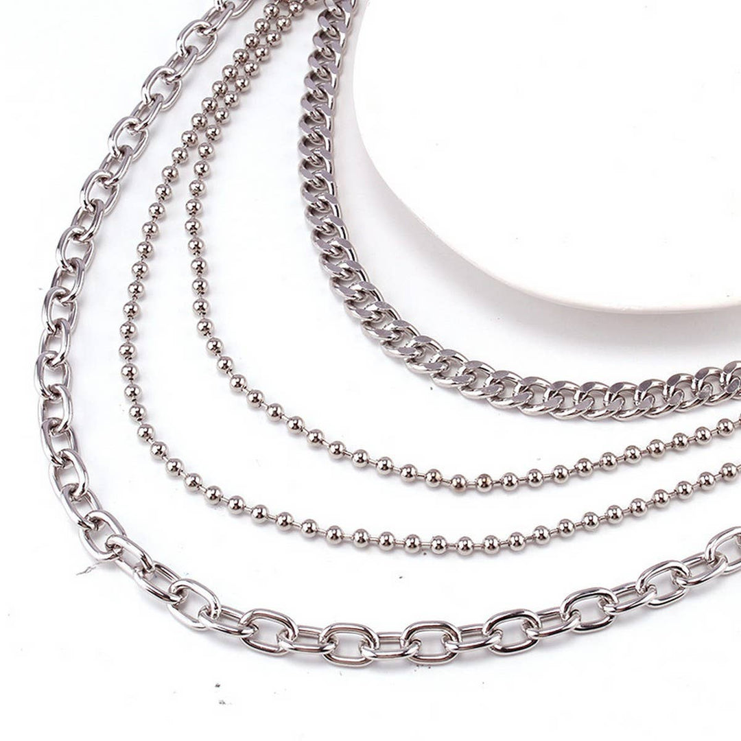 Dress up your favorite jeans with our Hip Hop Quad Jean Chain. The 2 Belt loop clips easily attach to you favorite old jeans. All you need is your best shirt or top and your good to go. Now in stock at our Smyrna, TN shop not far from the First Bank Amphitheater.

Metal alloy
See pic for dimensions
Imported