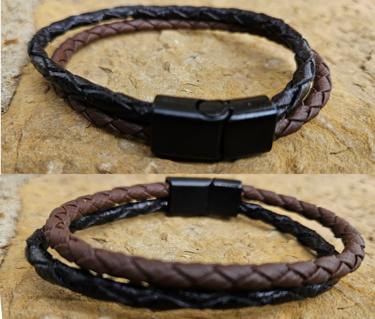 Plait is the word for 5 or more strips for a braid. The Cord of 2 is Leather meticulously handcrafted in Turkey. Designed for Comfort these bracelets offer a comfortable wear experience for any wrist size. Whether worn solo or layered with other accessories, they add a touch of rugged elegance to your attire. New to our Smyrna, TN shop come by and see them.

Fit&