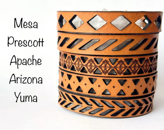 Assorted Southwestern style bracelet cuffs are made from laser engraved, premium, full grain leather, and finished with solid brass snap for a long lasting touch. It's comfortable and lightweight, making it great for everyday wear. 8 1/2 x 1/2 in. Stocked at our Smyrna, TN shop. 