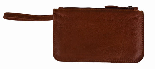 Our Kara wallet is a minimalist, sleek wristlet made from super soft Nappa leather. It can keep all your credit cards, cash, phone, and knick-knacks safely. Also works as a wristlet or keep it in your favorite bag when you have more stuff. Get yours at our world famous Smyrna, TN leather shop a short Uber ride from downtown Nashville.