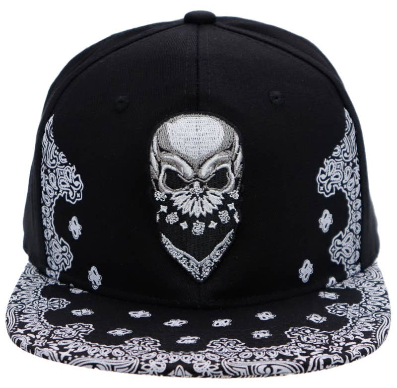 Skull Embroidered Paisley Bandana Print Six Panel Flat Bill Cotton Snapback. A skull is framed by a Timeless bandana design on the bill. In Stock at our Smyrna, TN shop not far from Murfreesboro.

100% Cotton
Snapback adjustment