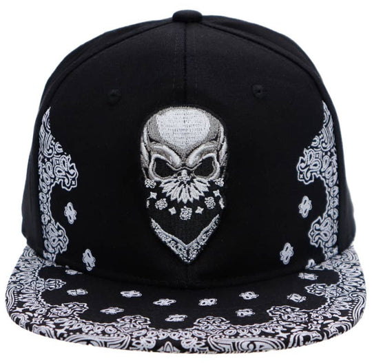 Skull Embroidered Paisley Bandana Print Six Panel Flat Bill Cotton Snapback. A skull is framed by a Timeless bandana design on the bill. In Stock at our Smyrna, TN shop not far from Murfreesboro.

100% Cotton
Snapback adjustment