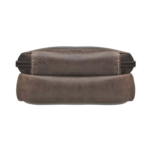 Compact Minimal Crossbody Pouch from Gun Toten' Mama is a low profile Conceal Carry purse.
Get yours at our Smyrna, TN store not far from Nashville.
The distressed brown shows a smooth oil infused Buffalo leather.
Flap closes with a magnetic closure over an open slot pocket.
Adjustable Slash Resistant Shoulder Strap clips on and off easily.
Strap length 25" to 49" long.
Overall Bag size: 5" Wide x 6-1/2" Tall x 2-1/4" Deep
Gun Compartment size: 4-3/4" Wide x 6-1/4" Tall
Gun Footprint: 4" Wide x 5" Tall