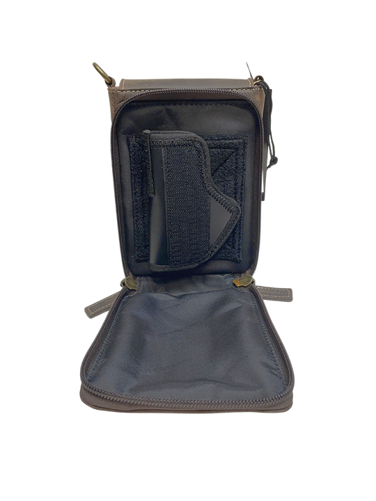 Compact Minimal Crossbody Pouch from Gun Toten' Mama.
Adjustable Slash Resistant Shoulder Strap that easily clips on and off.
Strap length 25" to 49" long.
Overall Bag size: 5" Wide x 6 - 1/2" Tall x 2 - 1/4" Deep
GTM Gun Compartment size: 4 - 3/4" Wide x 6 - 1/4" Tall
Gun Footprint: 4" Wide x 5" Tall
Designed for Left and Right Handed use as a Top Draw. (We recommend practicing your draw).
Zipper opens all three sides to reveal an included mini holster positioned with hook and loop.