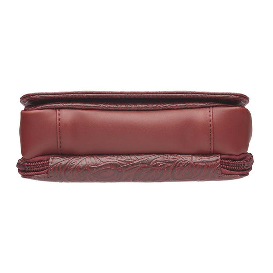 This Compact Crossbody Organizer from Gun Toten' Mama is a low profile Conceal Carry purse with enough space for just the essentials.
Get yours at our Smyrna, TN store not far from Nashville.


Tooled cowhide shows a rose leaf pattern offered in Black, Tan, or Red.
The distressed brown shows a smooth Buffalo leather.
Flap closes with a Rare Earth Magnetic Closure.
Slot and zippered lining pockets.
Pen slot.
Adjustable Slash Resistant Shoulder Strap that easily clips on and off.

Strap length 25" to 49