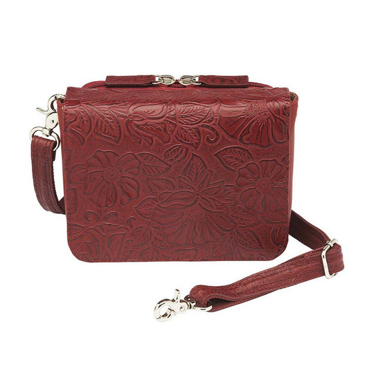 This Compact Crossbody Organizer from Gun Toten' Mama is a low profile Conceal Carry purse with enough space for just the essentials.
Get yours at our Smyrna, TN store not far from Nashville.


Tooled cowhide shows a rose leaf pattern offered in Black, Tan, or Red.
The distressed brown shows a smooth Buffalo leather.
Flap closes with a Rare Earth Magnetic Closure.
Slot and zippered lining pockets.
Pen slot.
Adjustable Slash Resistant Shoulder Strap that easily clips on and off.

Strap length 25" to 49