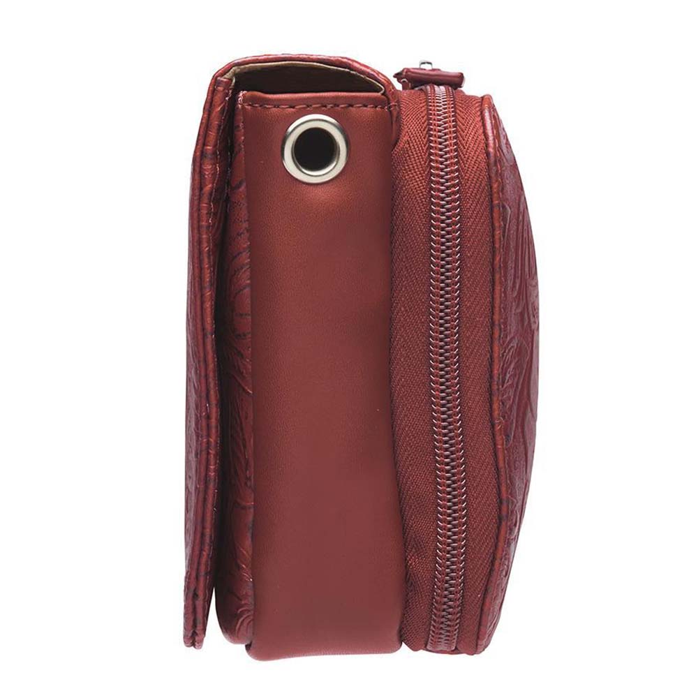 This Compact Crossbody Organizer from Gun Toten' Mama is a low profile Conceal Carry purse with enough space for just the essentials.
Get yours at our Smyrna, TN store not far from Nashville.


Tooled cowhide shows a rose leaf pattern offered in Black, Tan, or Red.
The distressed brown shows a smooth Buffalo leather.
Flap closes with a Rare Earth Magnetic Closure.
Slot and zippered lining pockets.
Pen slot.
Adjustable Slash Resistant Shoulder Strap that easily clips on and off.

Strap length 25" to 49